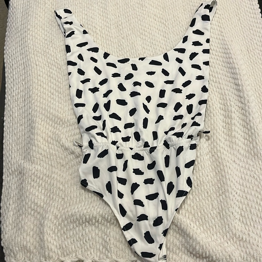 Black and white body suit backless